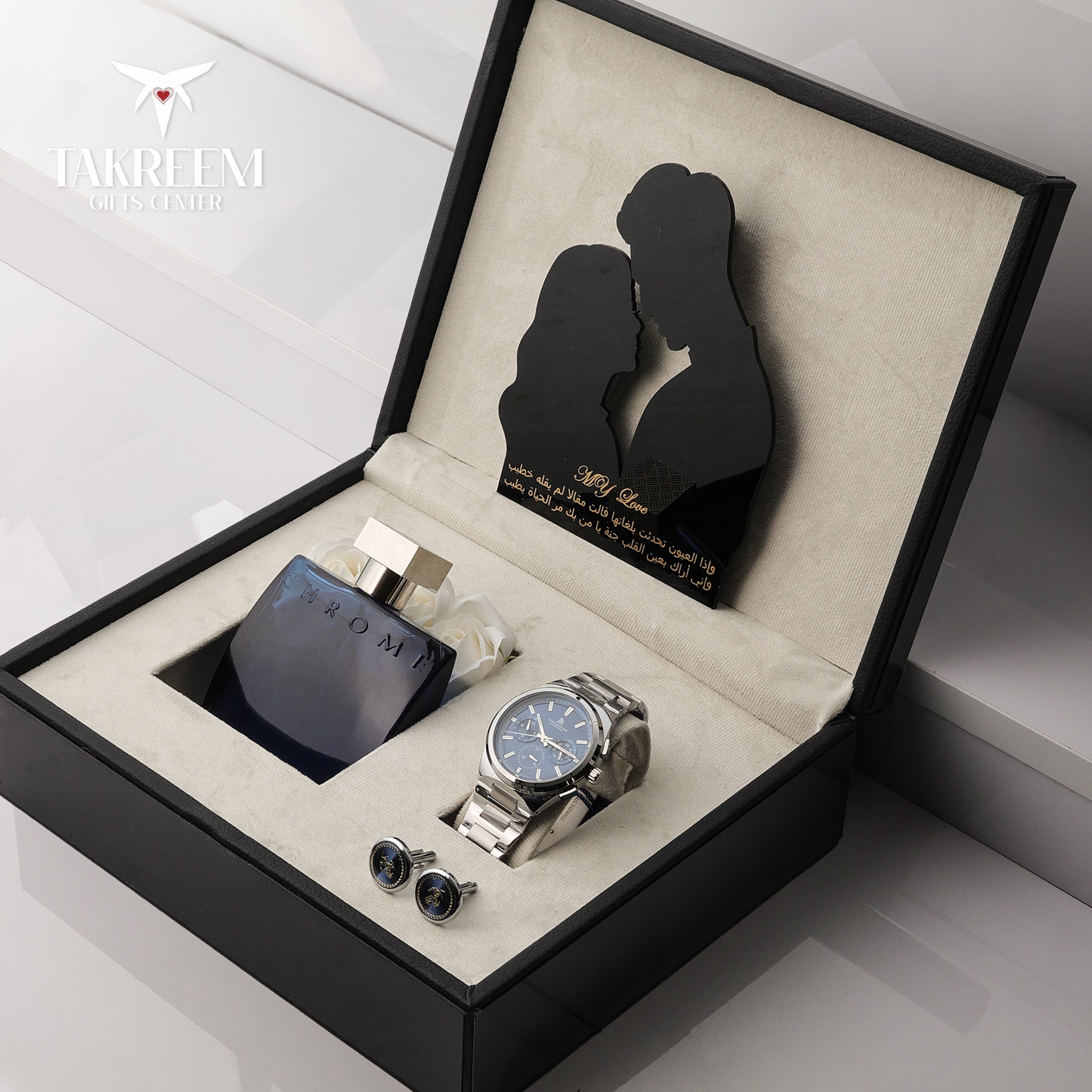 Gift set with watch, perfume, and cufflinks in a decorative box with 'JACKRETT' branding.