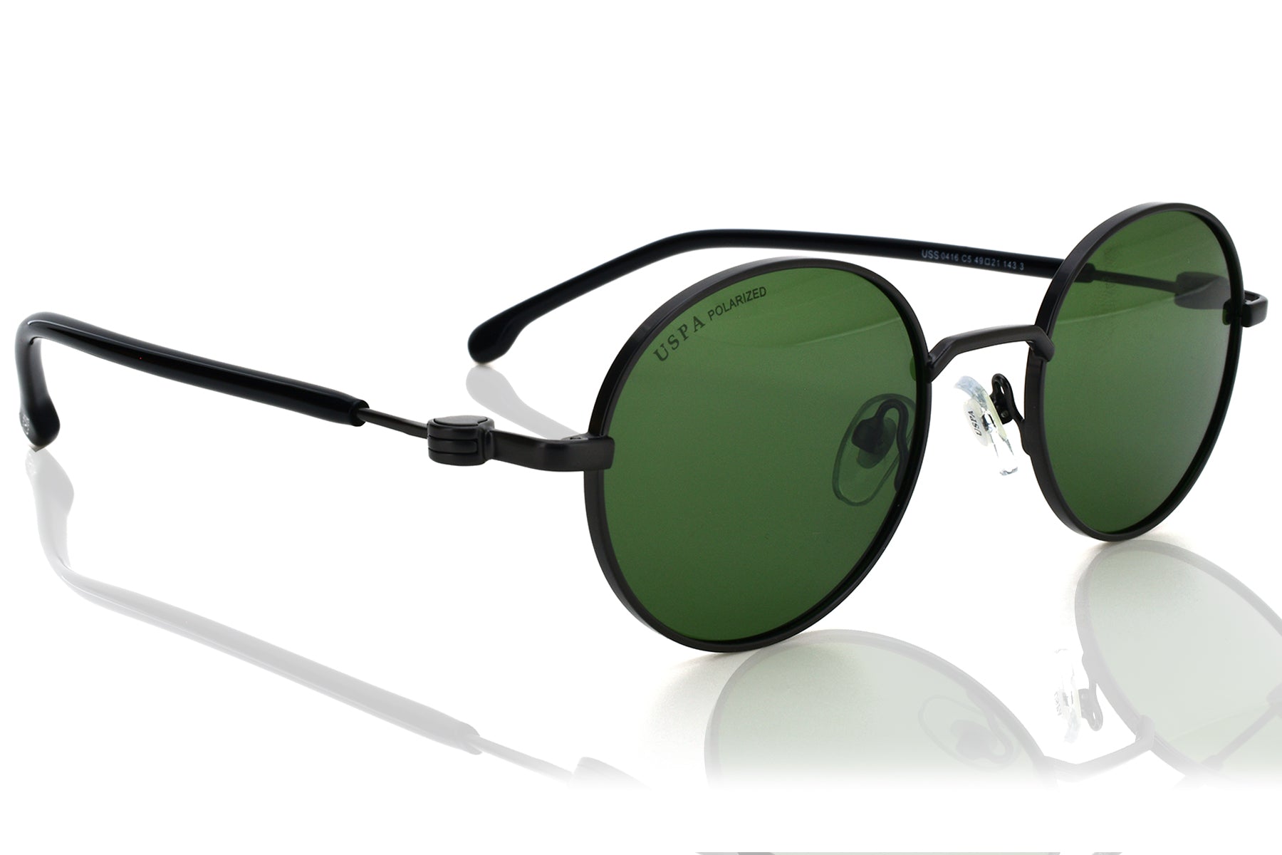 Round sunglasses with black frames and green lenses on a white background