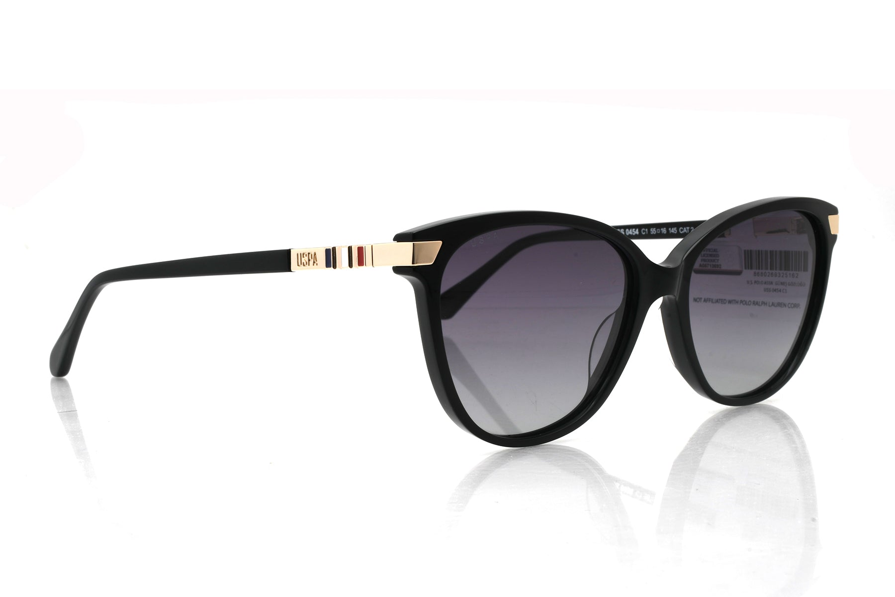 Black sunglasses with gold accents on a white background