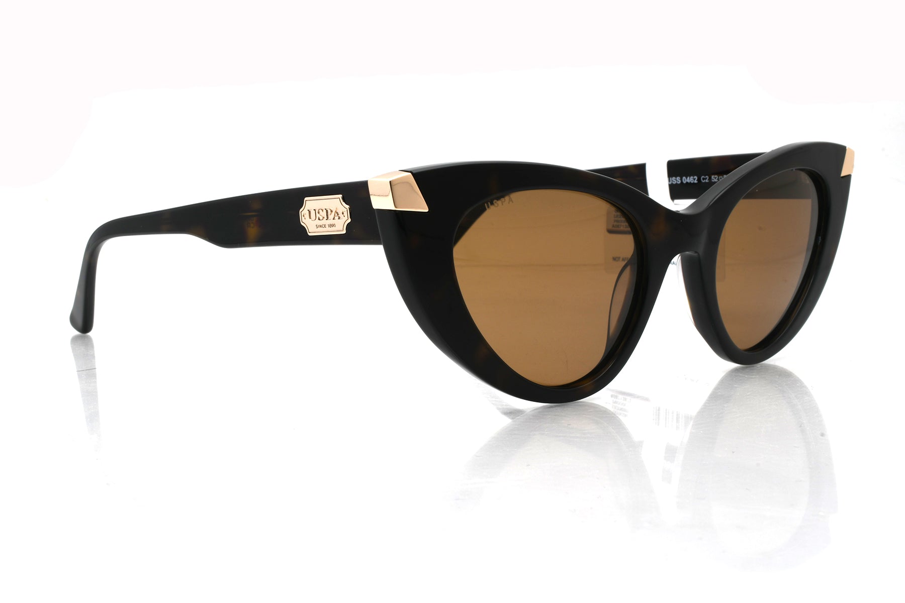 Cat-eye sunglasses with black frame and brown lenses on a white background