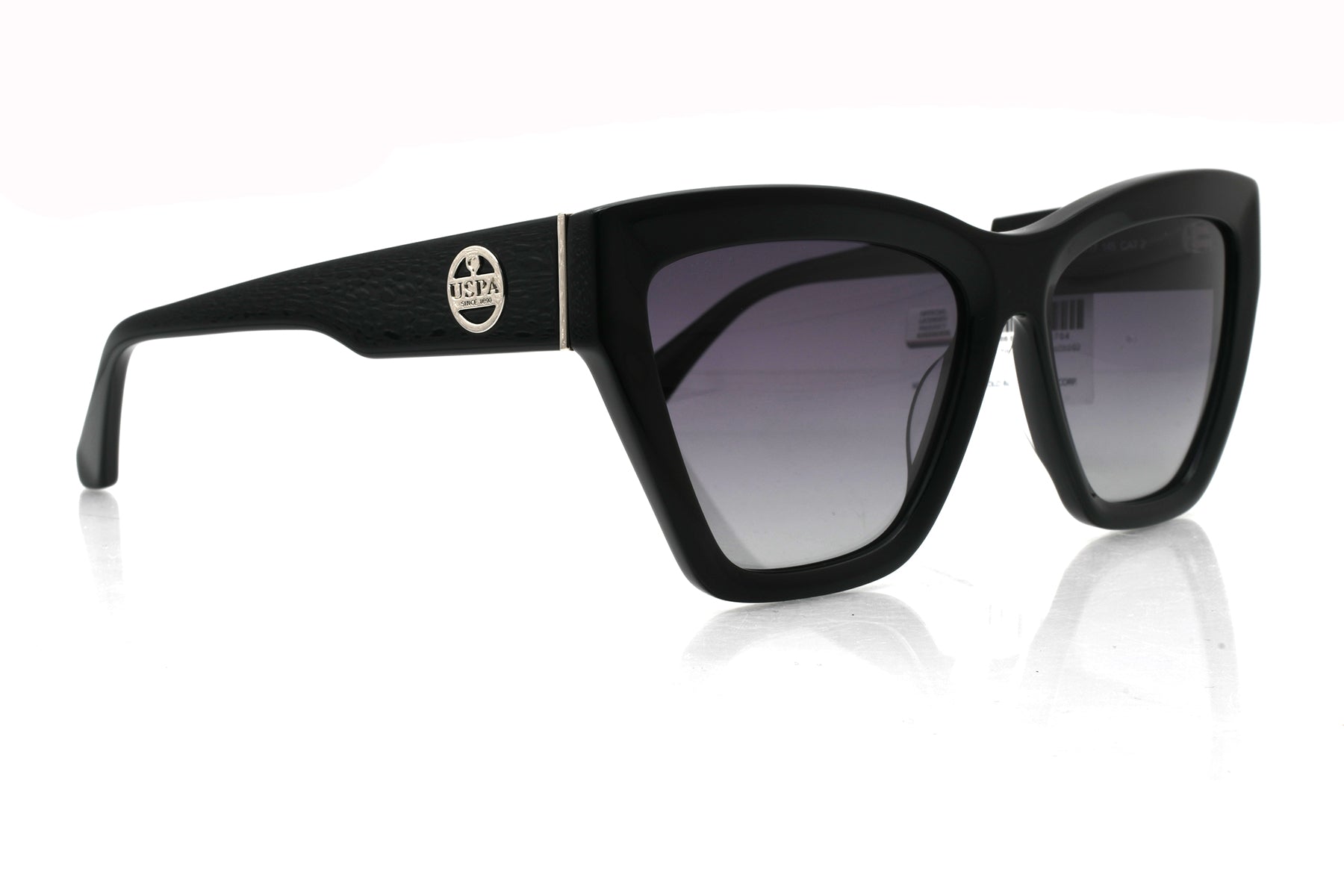 Black sunglasses with gradient lenses on a white background