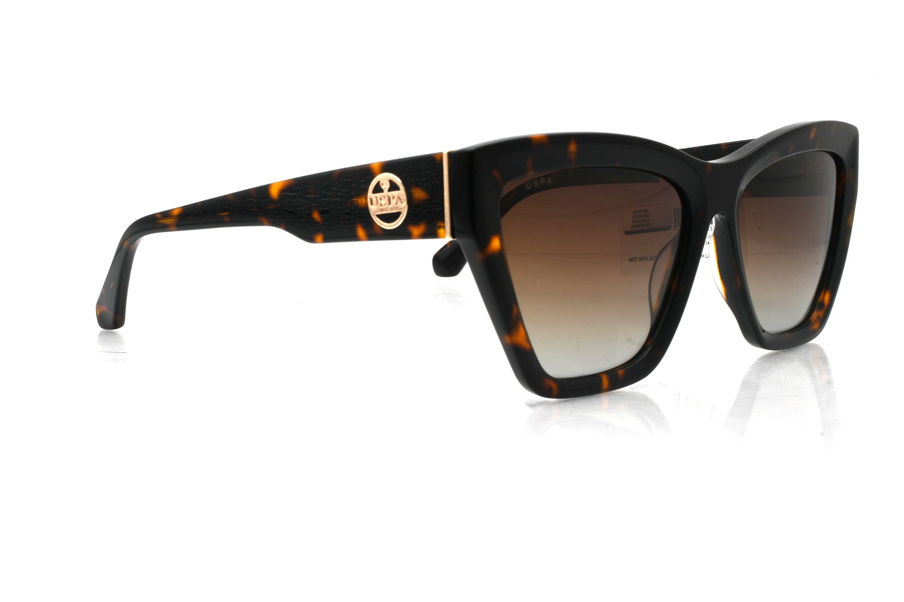 Sunglasses with tortoiseshell frame and gradient lenses on a white background