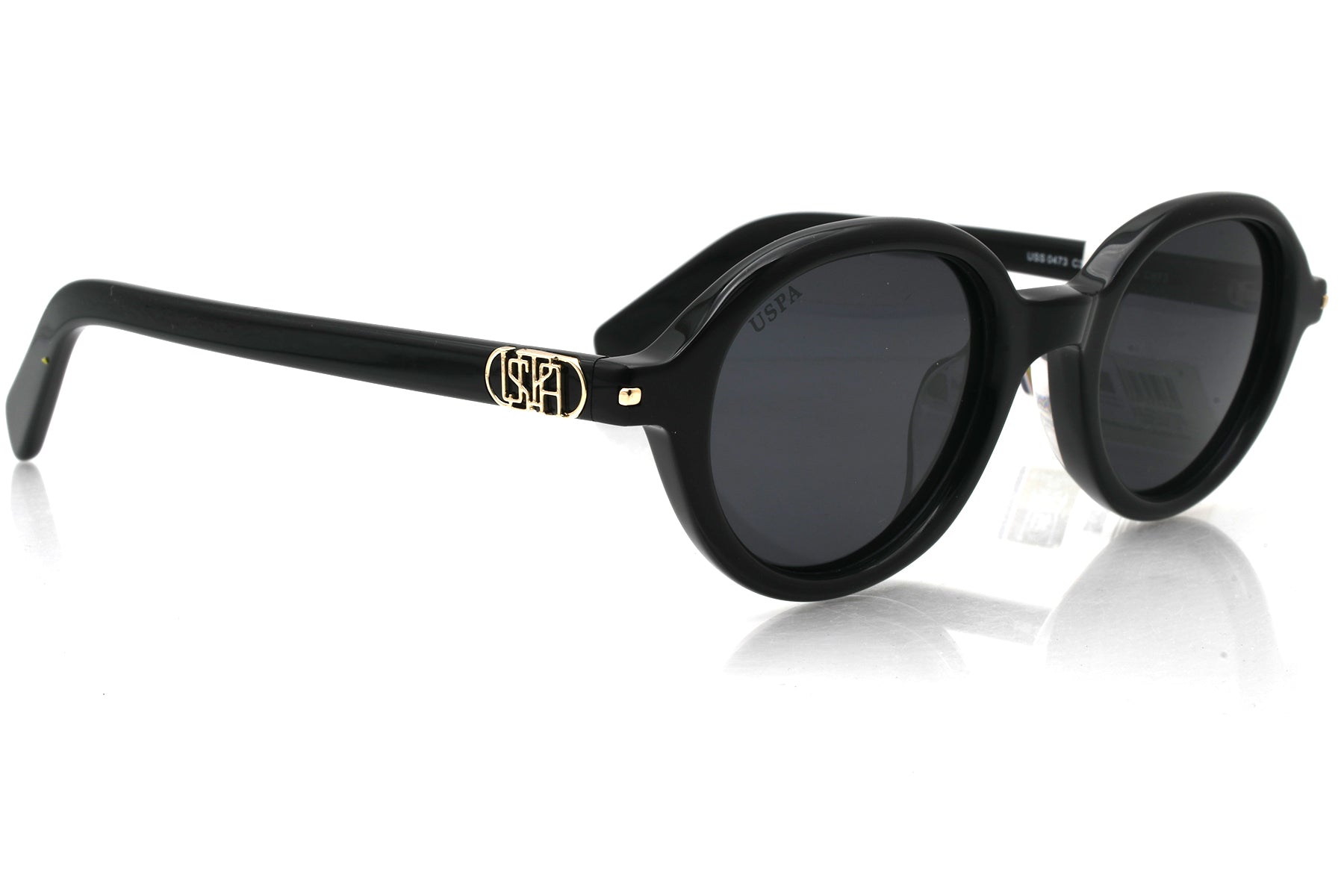 Black sunglasses with a reflective surface on a white background