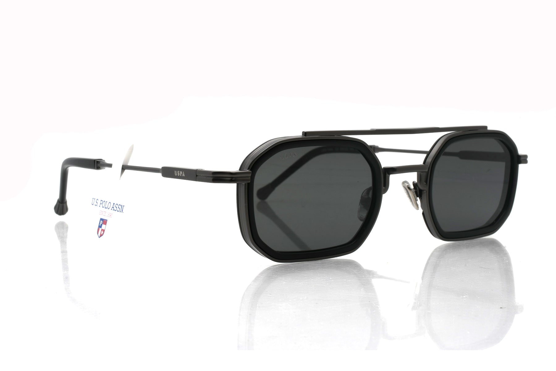 Black sunglasses with a reflective surface on a white background