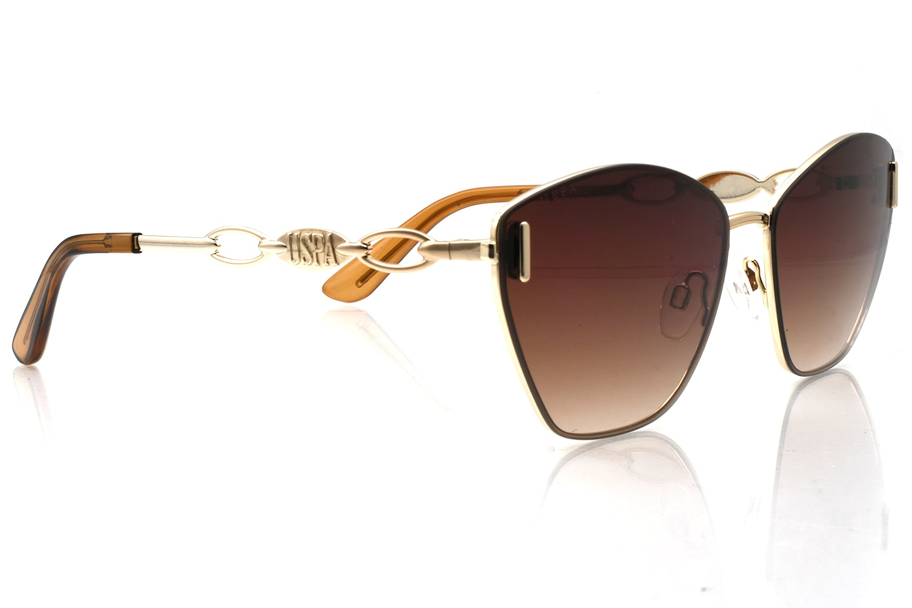 Sunglasses with gold frame and brown gradient lenses on a white background