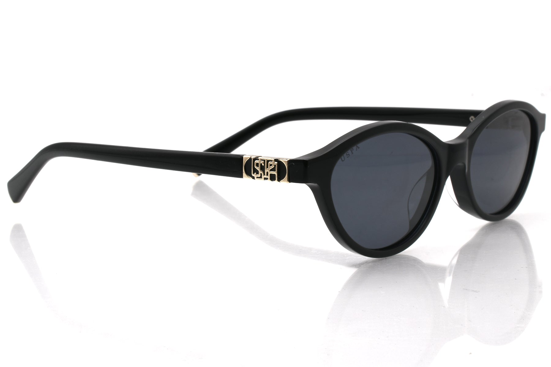 Black sunglasses with a reflective surface on a white background