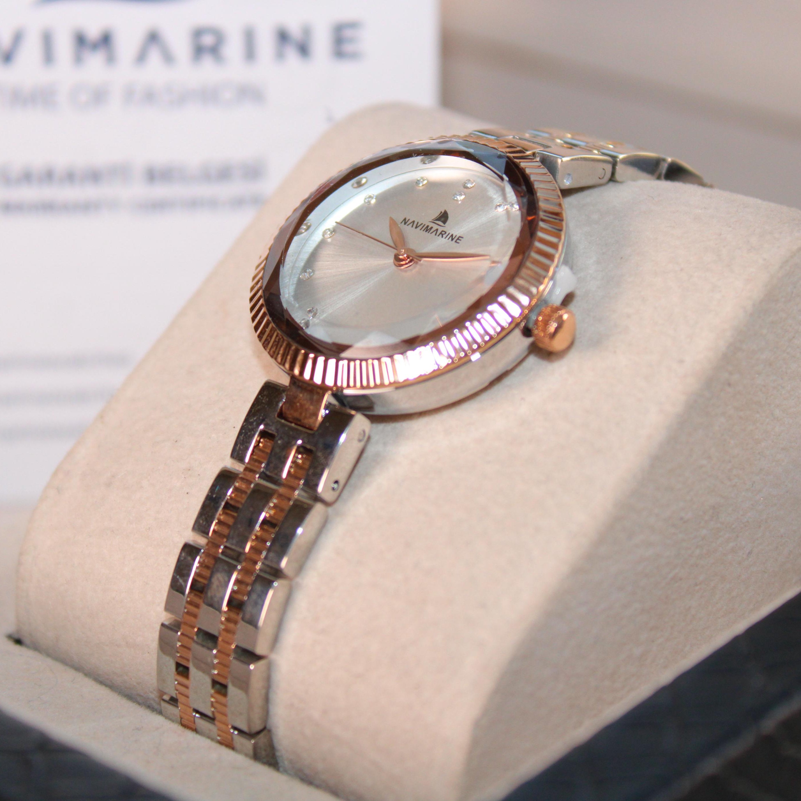 Navimarine watch on display with a branded box in the background
