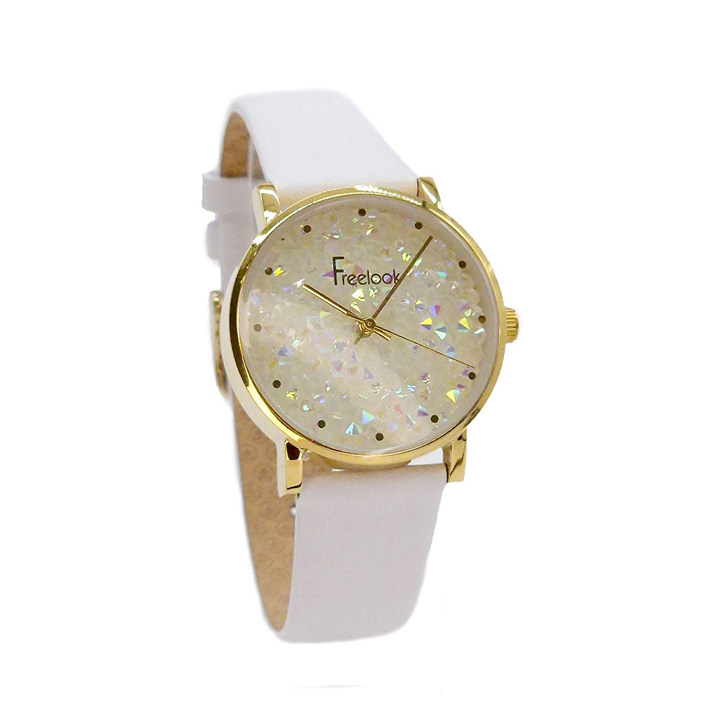 Wristwatch with gold case and white strap on a white background
