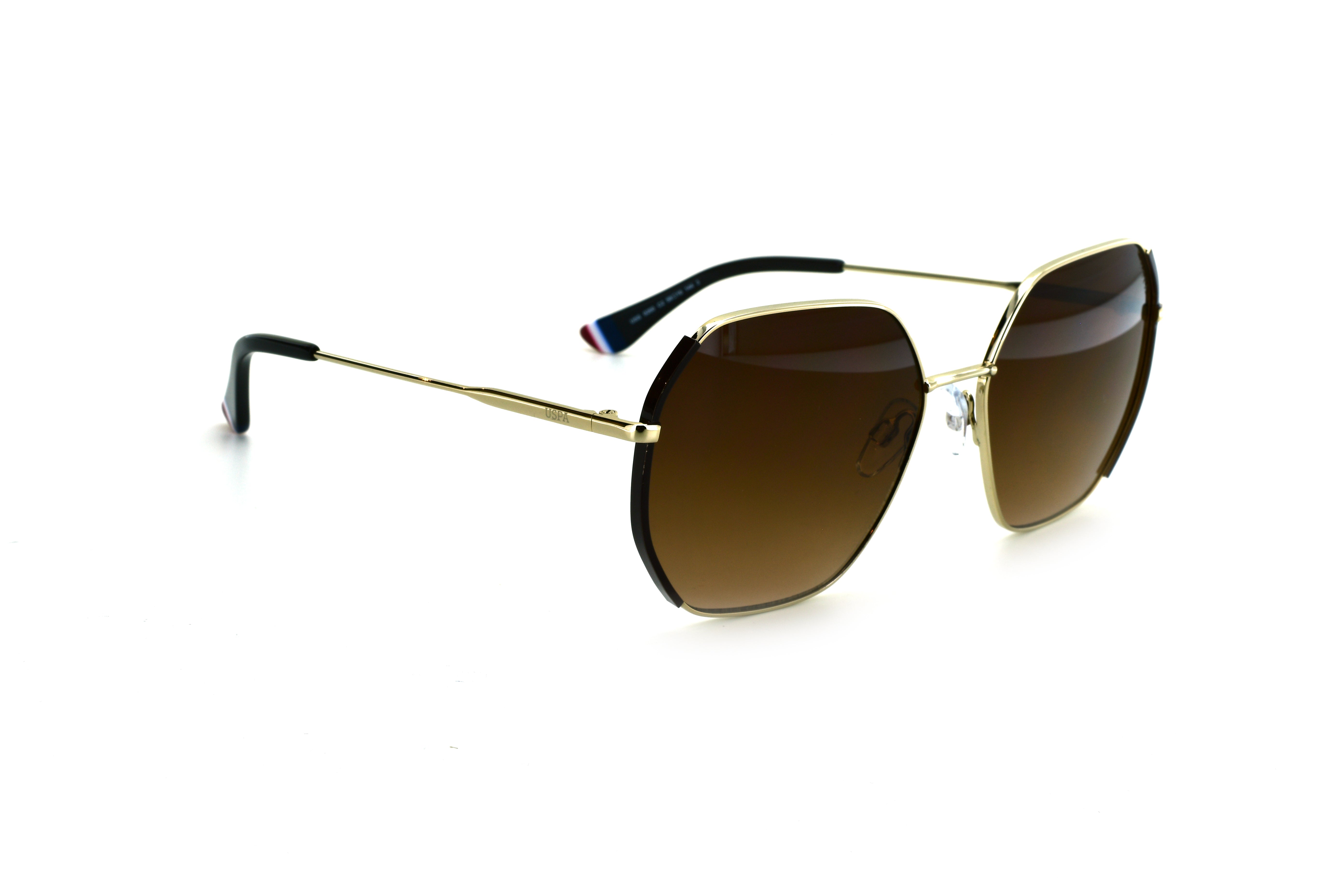 Sunglasses with gold frame and brown lenses on a white background