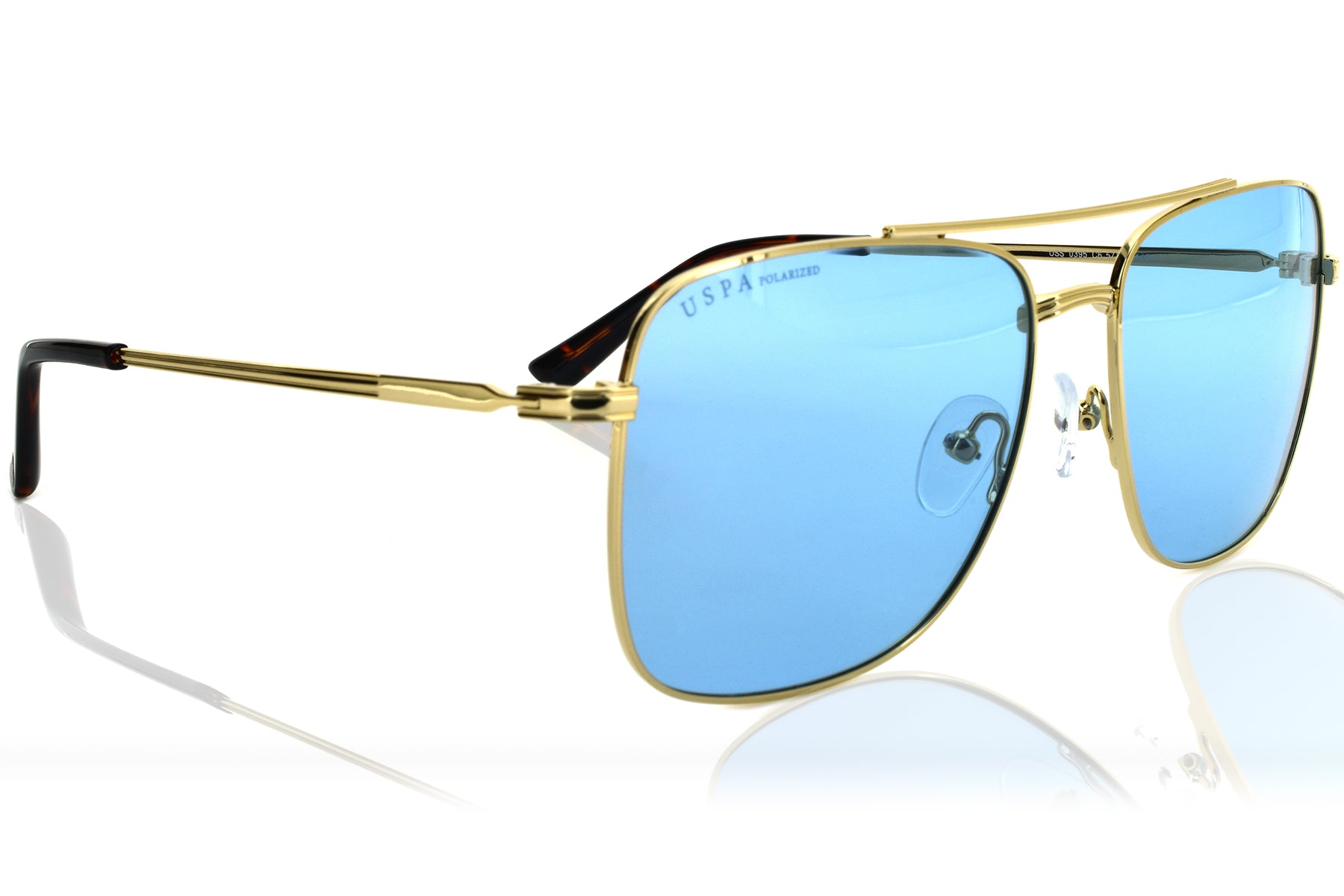 Gold-framed sunglasses with blue lenses on a white background