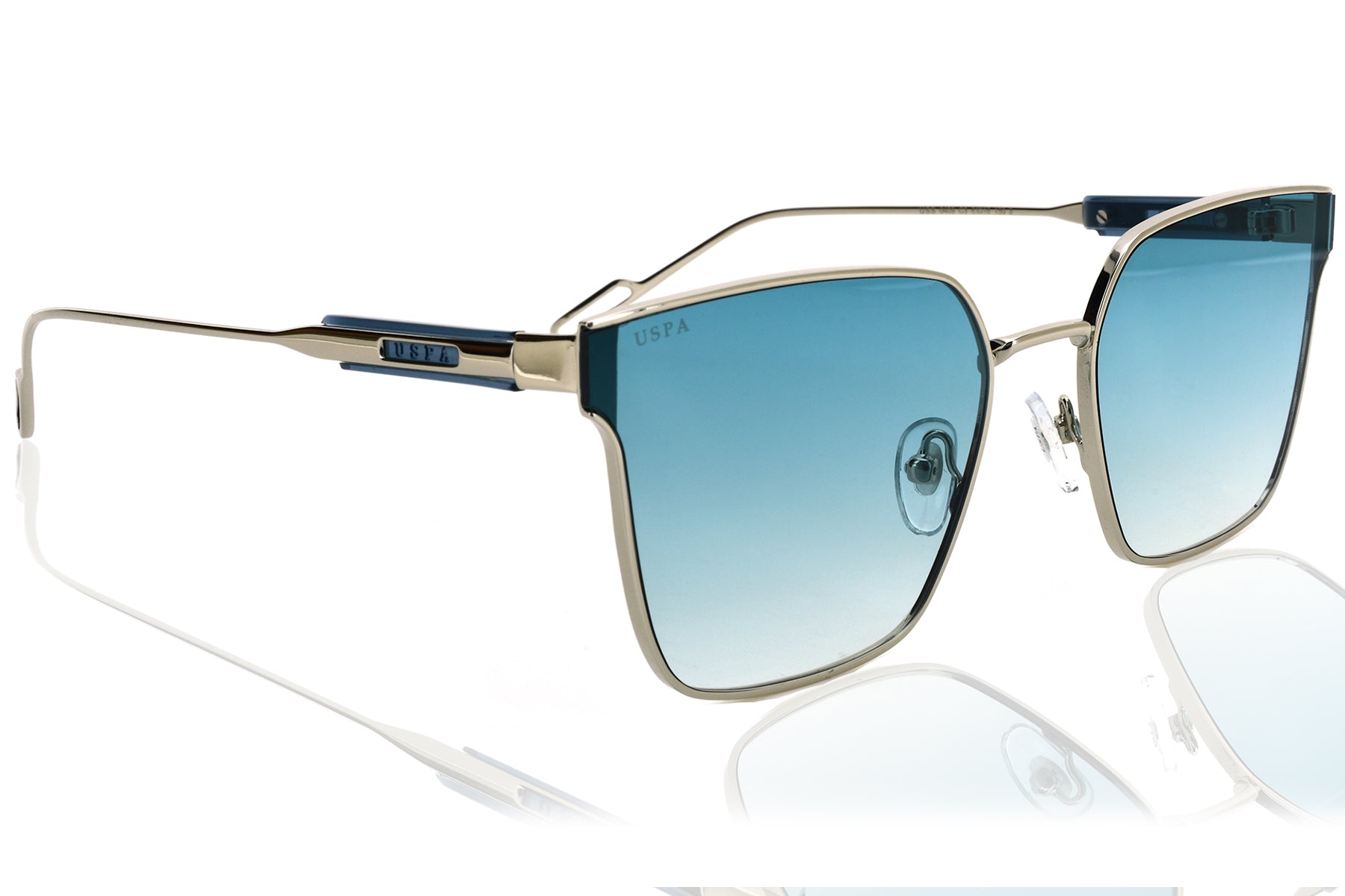 Sunglasses with blue gradient lenses and gold frame on a white background