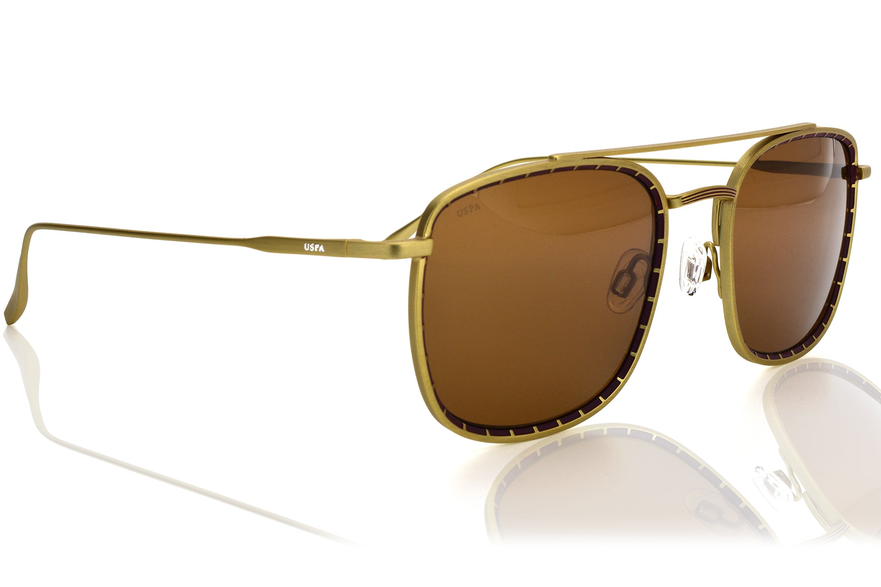 Gold-framed sunglasses with brown lenses on a white background