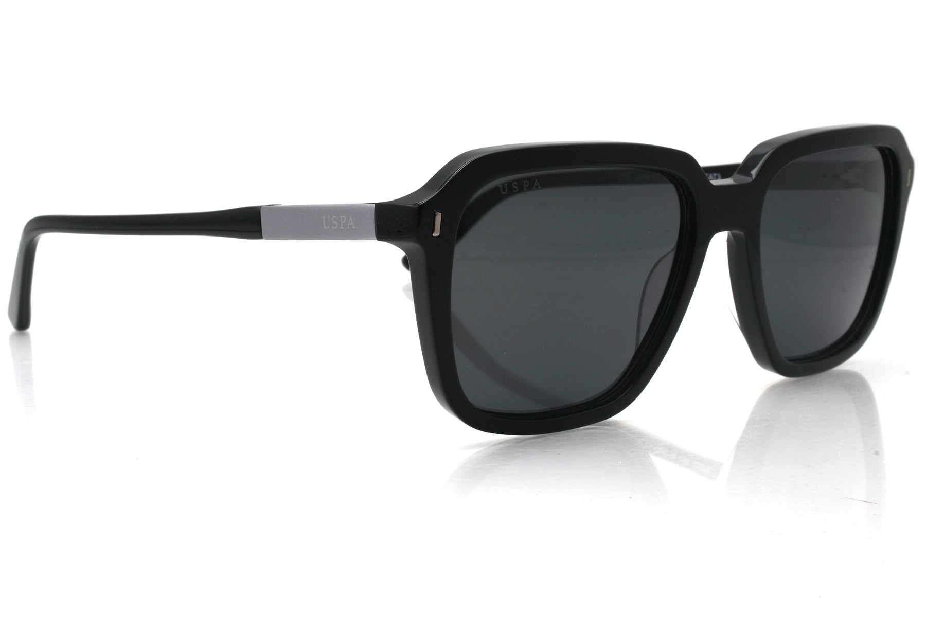 Black sunglasses with a reflective surface on a white background