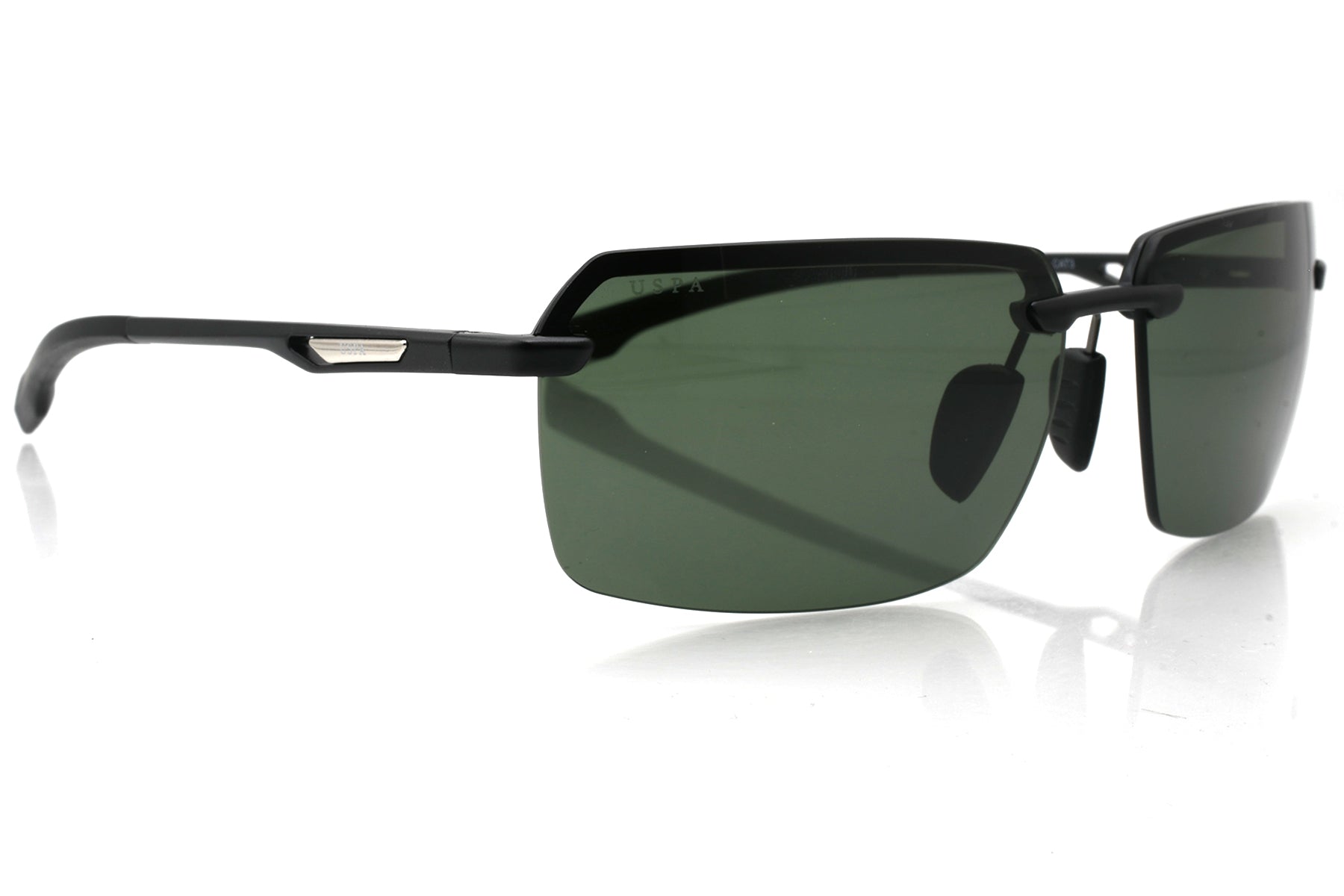 Sunglasses with black frame and green lenses on a white background