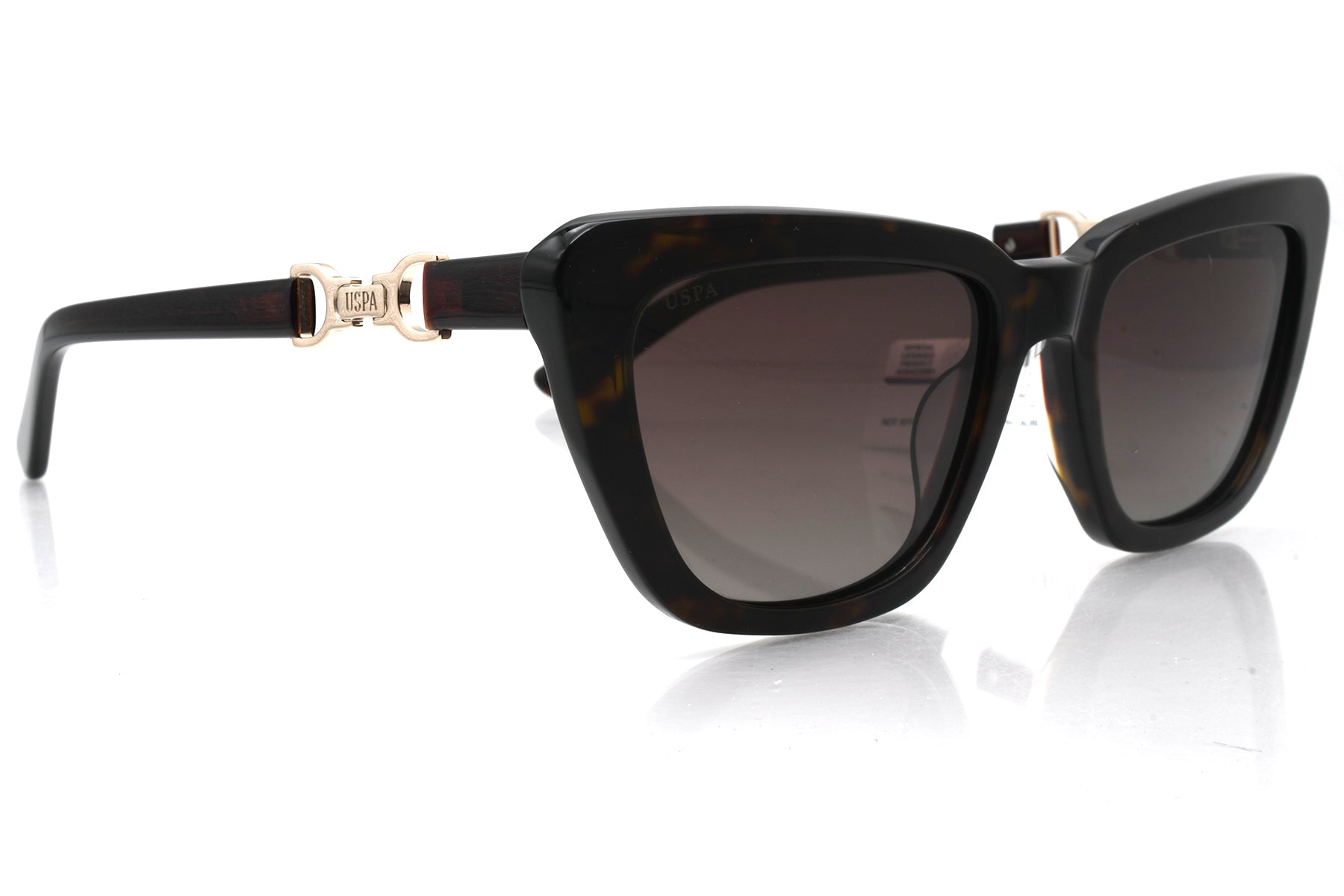 Black sunglasses with gold accents on a white background