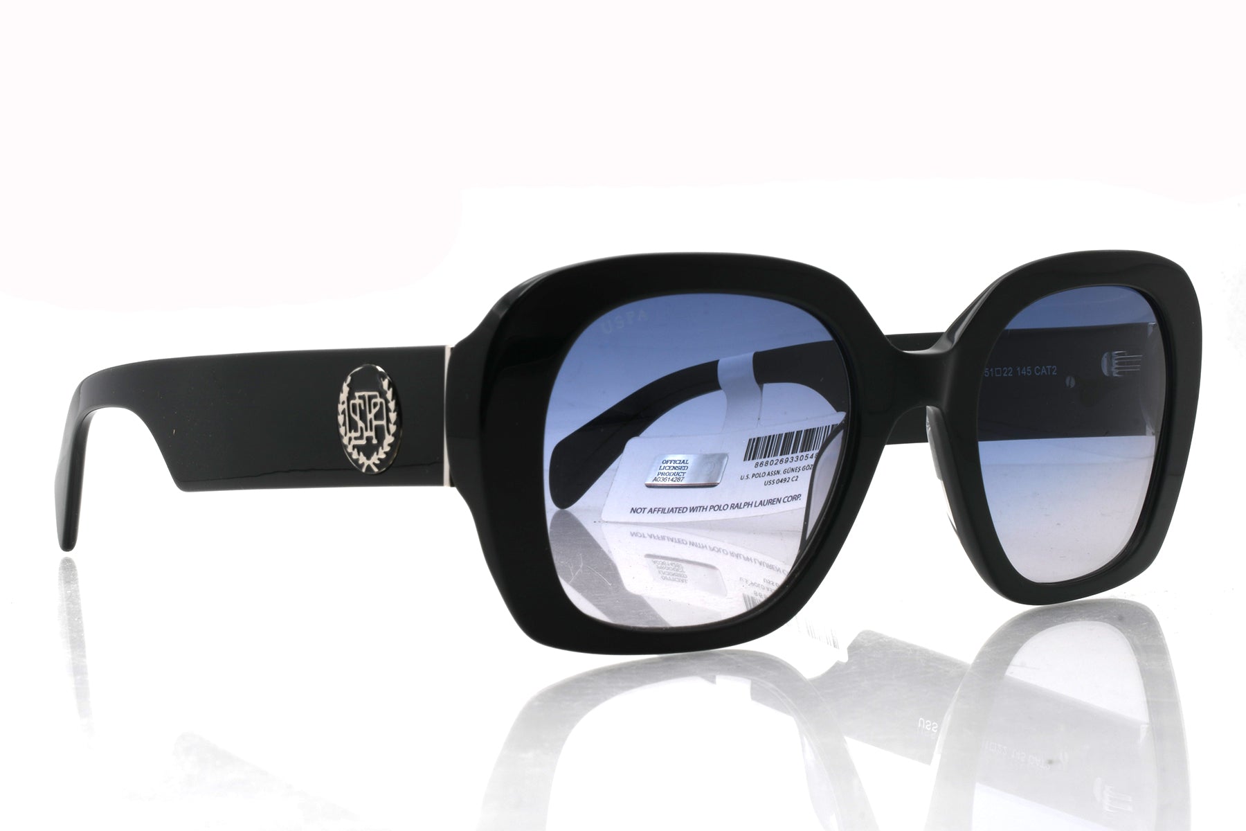 Black sunglasses with reflective lenses on a white background