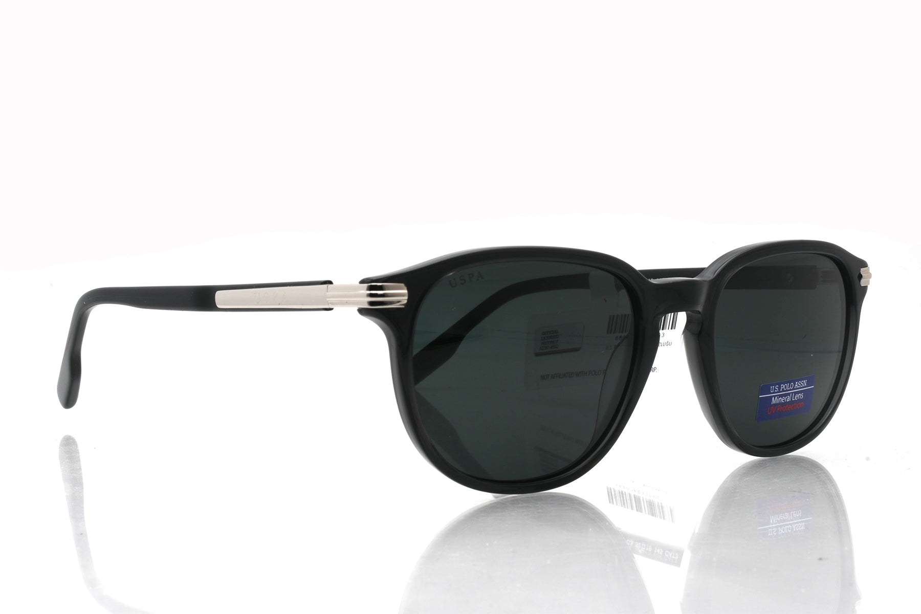 Black sunglasses with a reflective surface on a white background