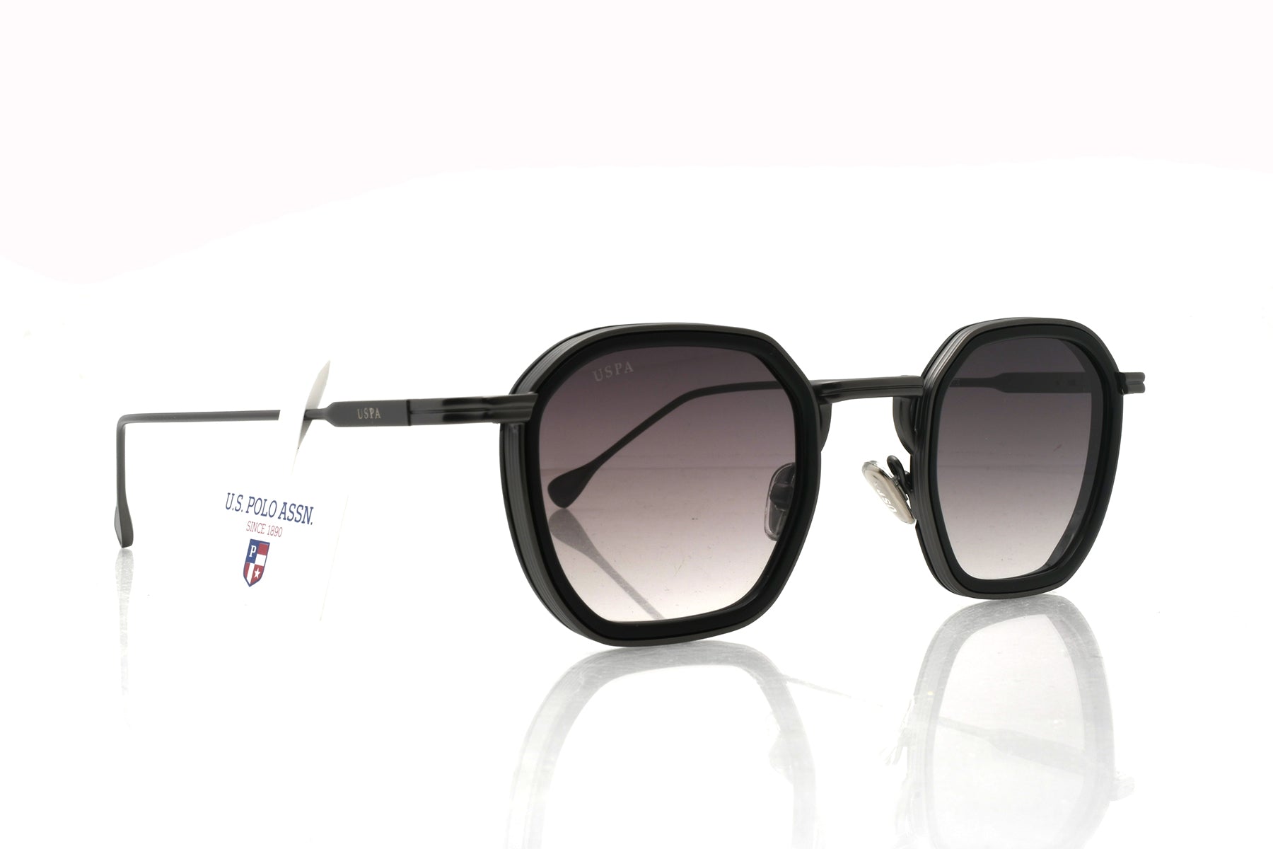 Black sunglasses with gradient lenses on a white background