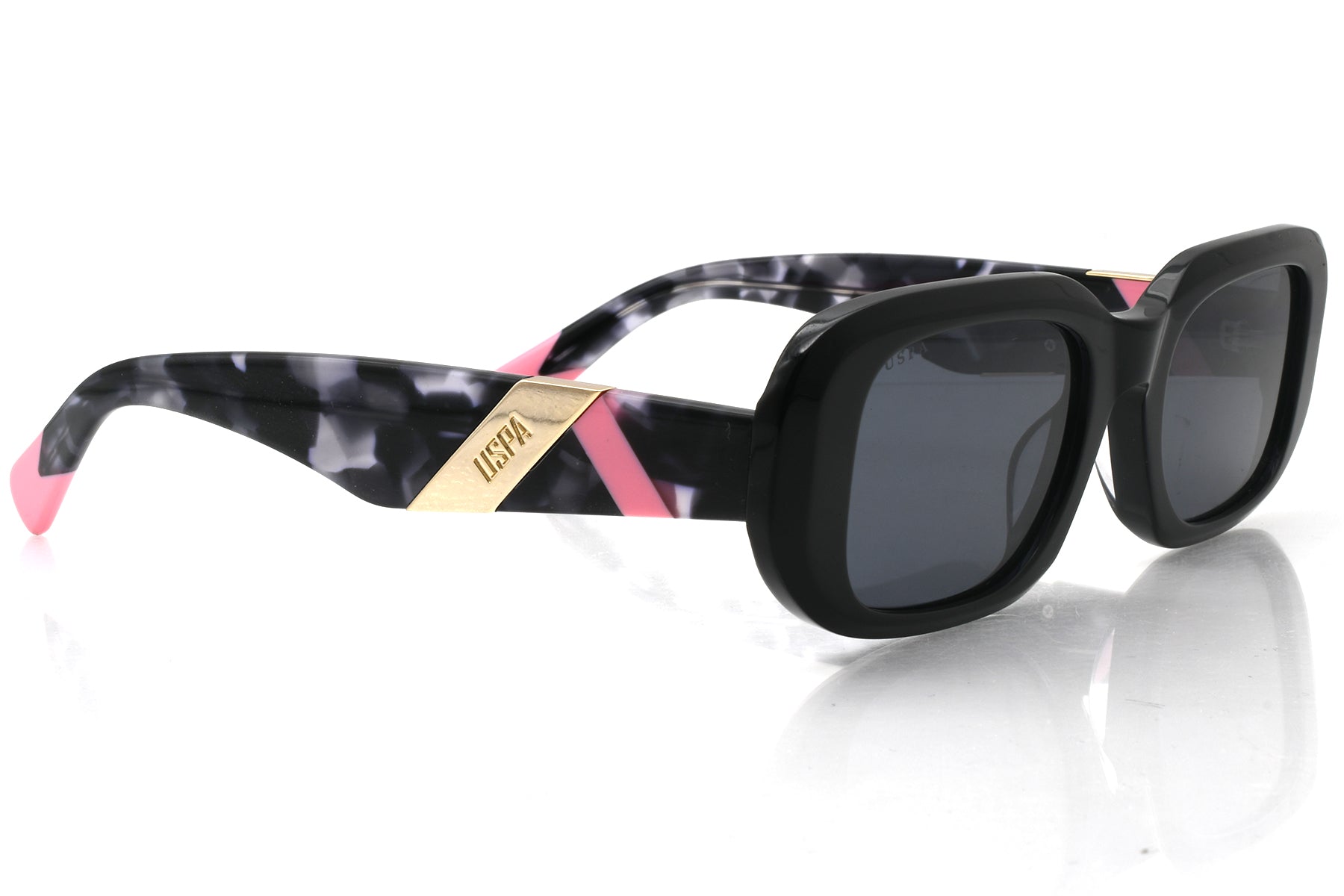 Sunglasses with black and pink marbled frame on a white background