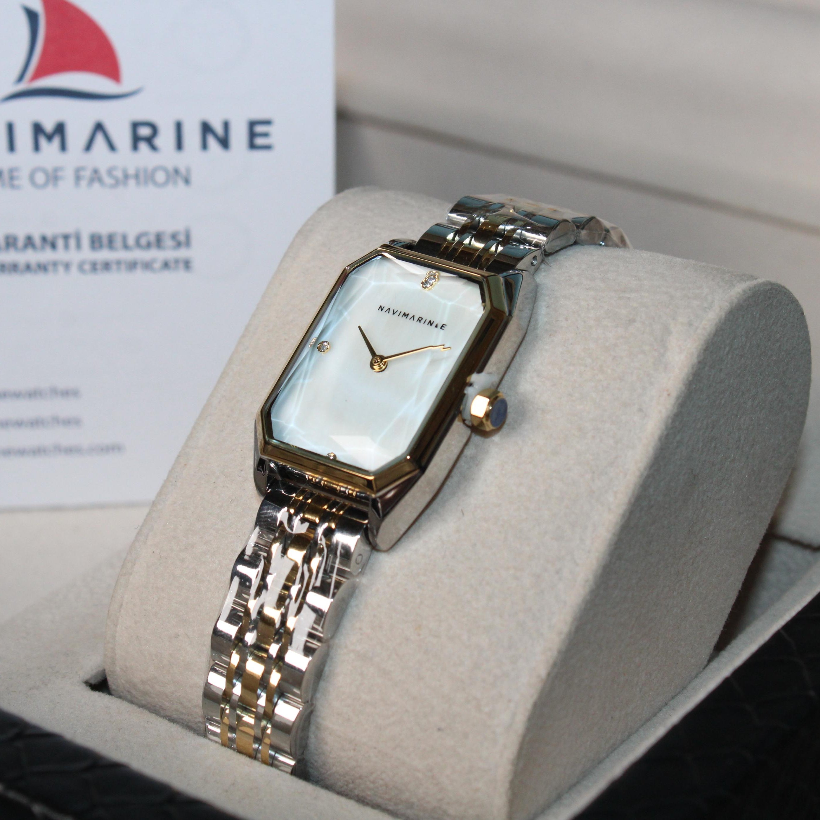 Silver watch with white face in a Navimagine box