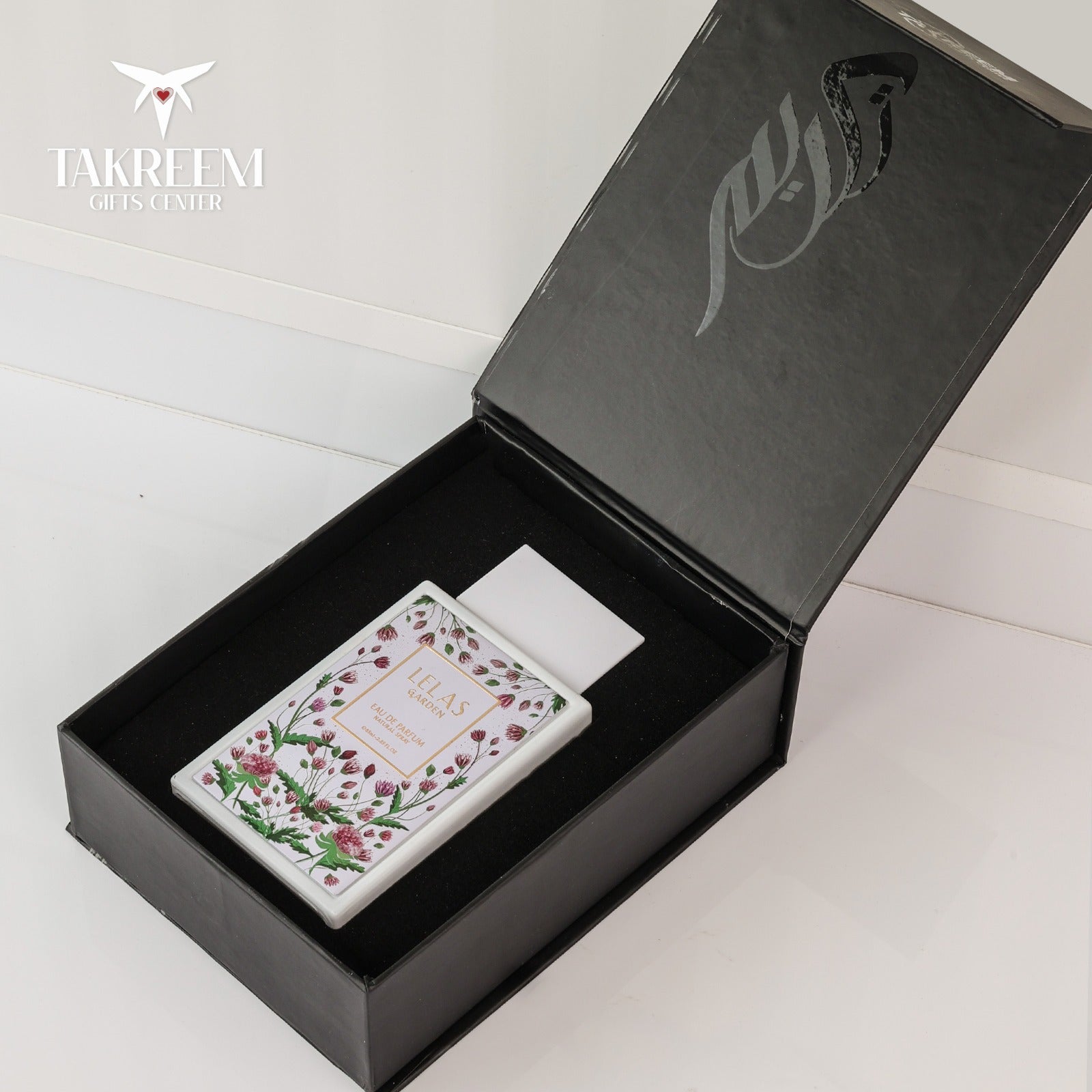 Floral card in a black box with 'Takreem' branding on a white background