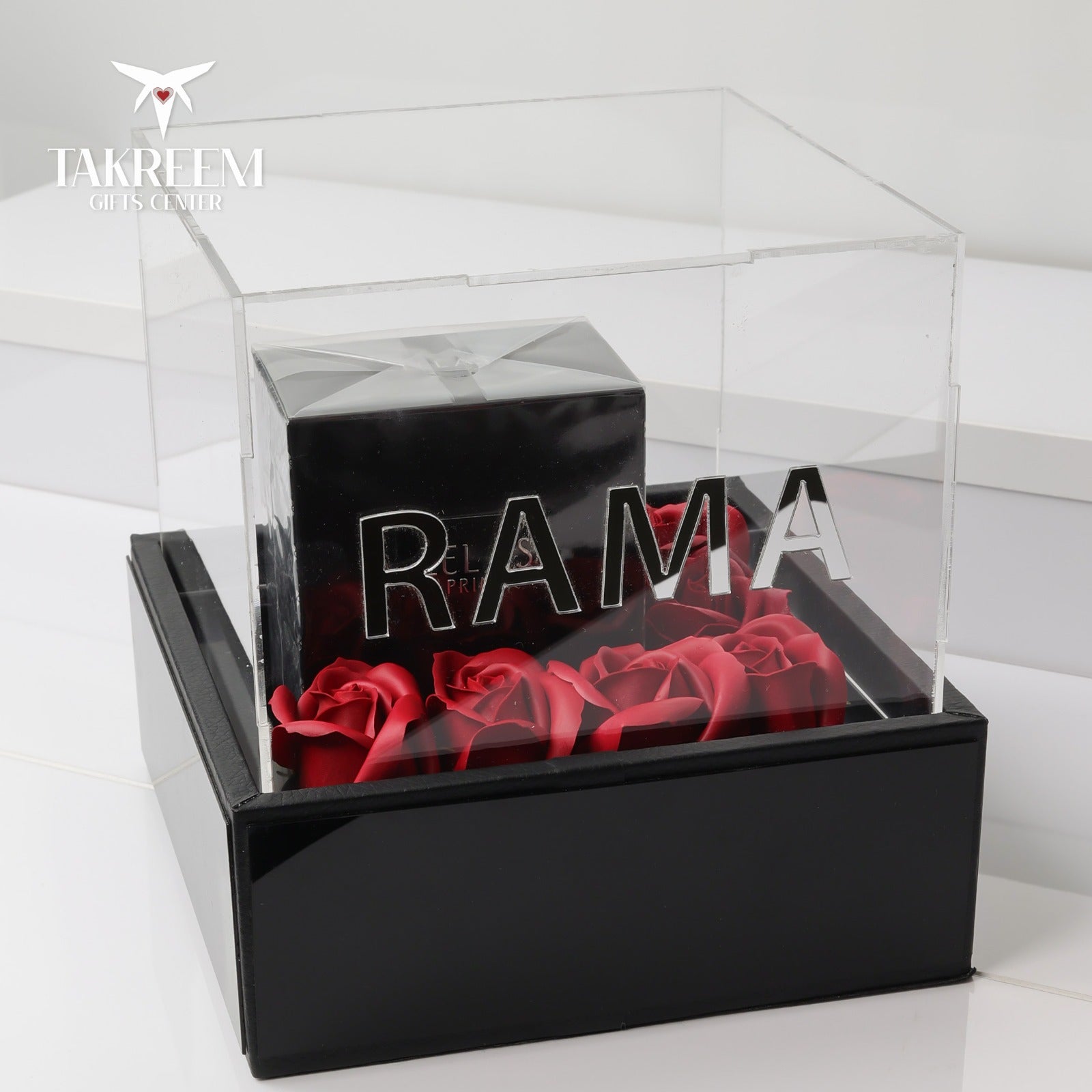 Black box with red roses and 'RAMA' branding on a white background