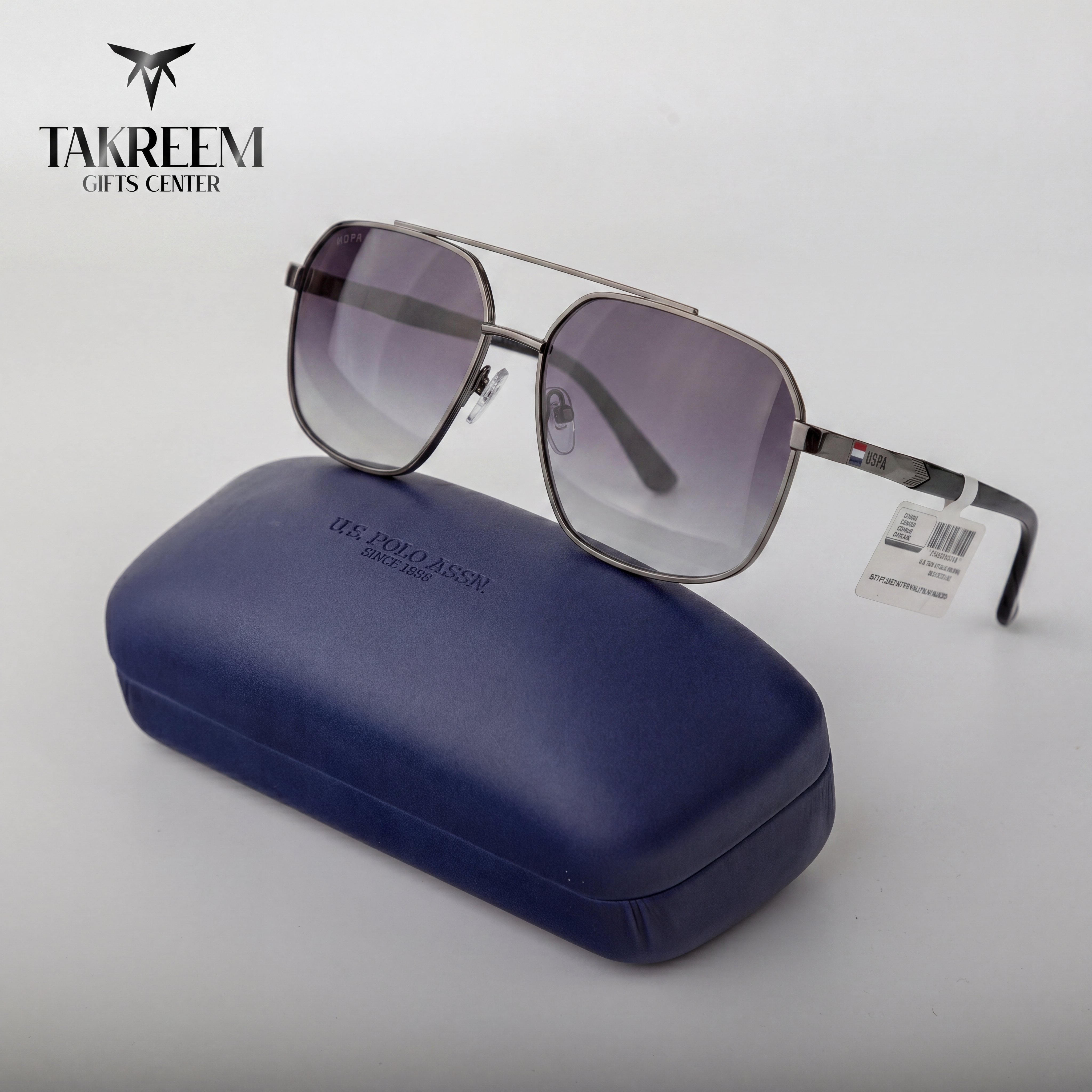 Sunglasses with a blue case on a white background, featuring the Polo Ralph Lauren logo.