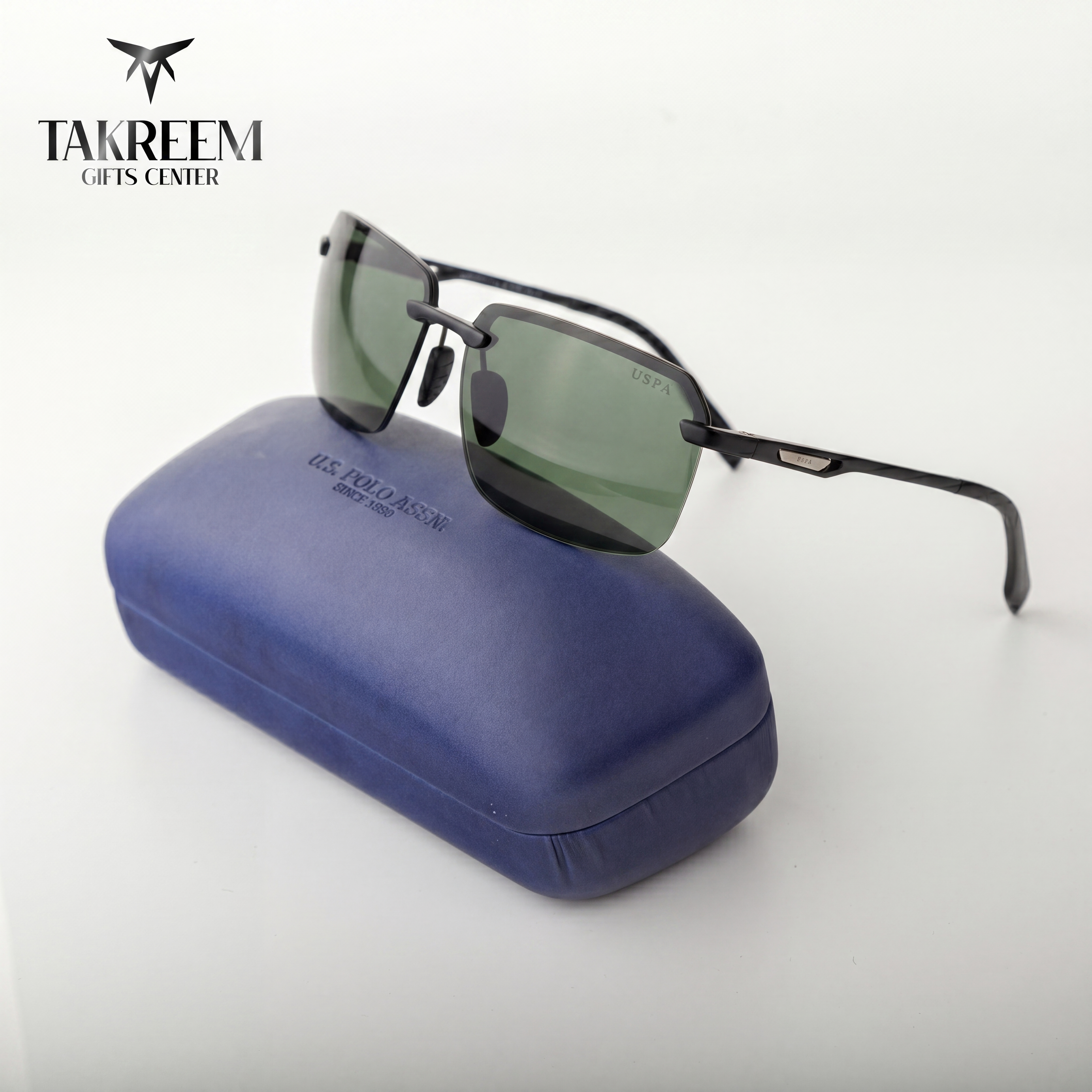Sunglasses with a blue case on a white background, featuring the Takreem Gifts Center brand.